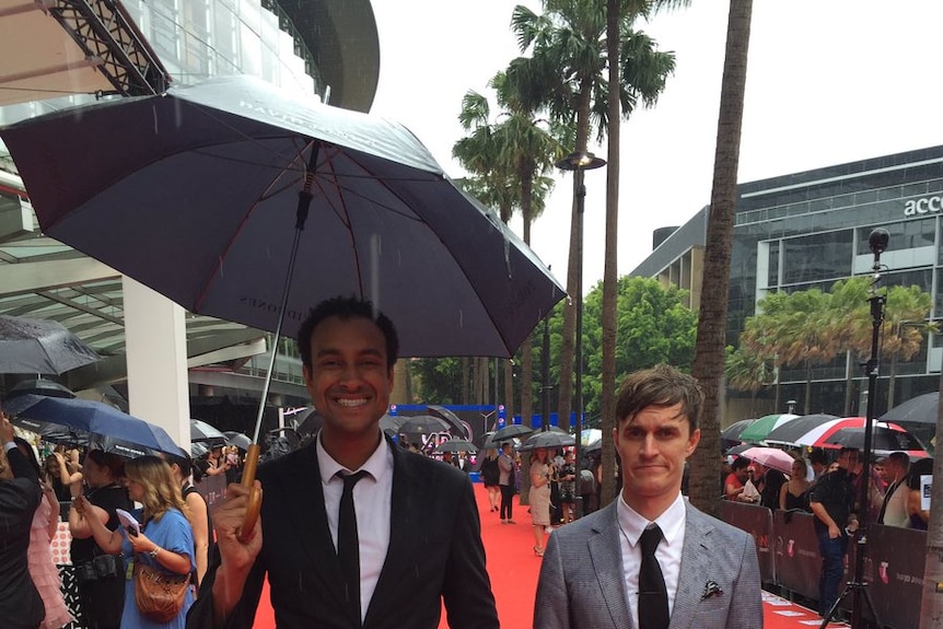 Triple j hosts Matt and Alex brave the rain to walk down the ARIA Awards red carpet.