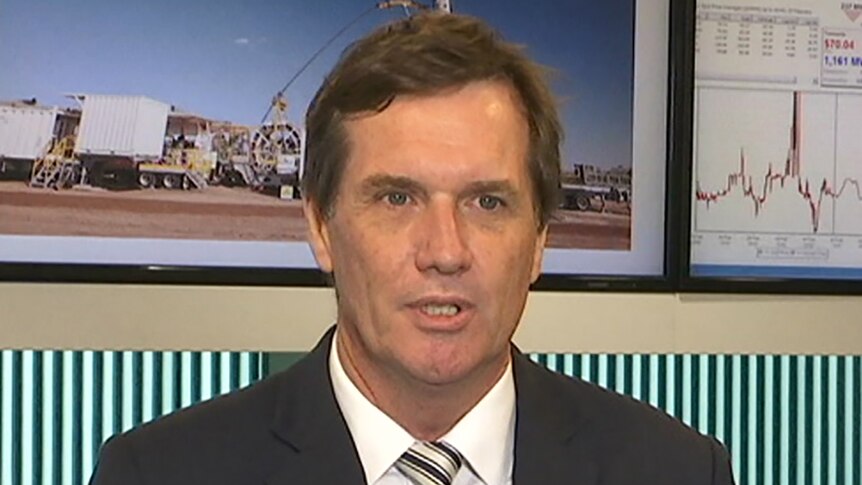 Qld Energy Minister Anthony Lynham speaking to reporters