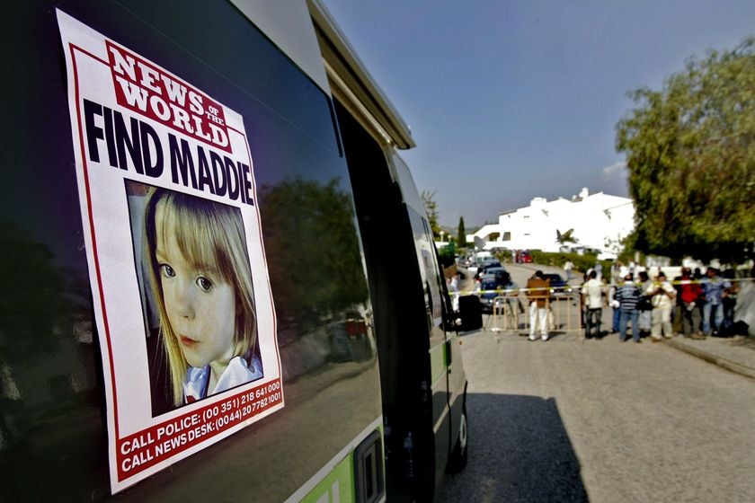 A poster placed on a van shows a picture of missing British girl Madeleine McCann.