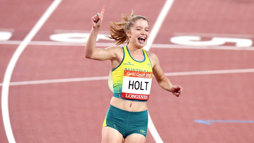 Australia's Isis Holt celebrates after her win in the women's T35 100m