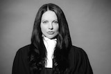 A black and white photo of Zagi Kozarov in her legal robes.