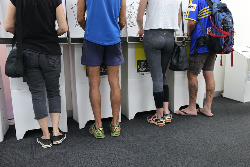 People attend the voting centre in Mitchell Street during the NT council elections. Image taken August 26, 2017.