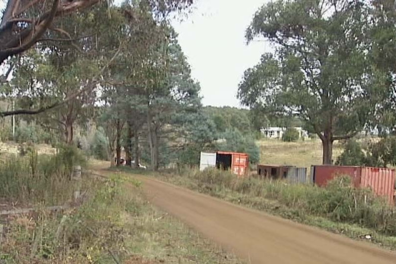 Shipping containers on a Mount Lloyd property, Tasmania.