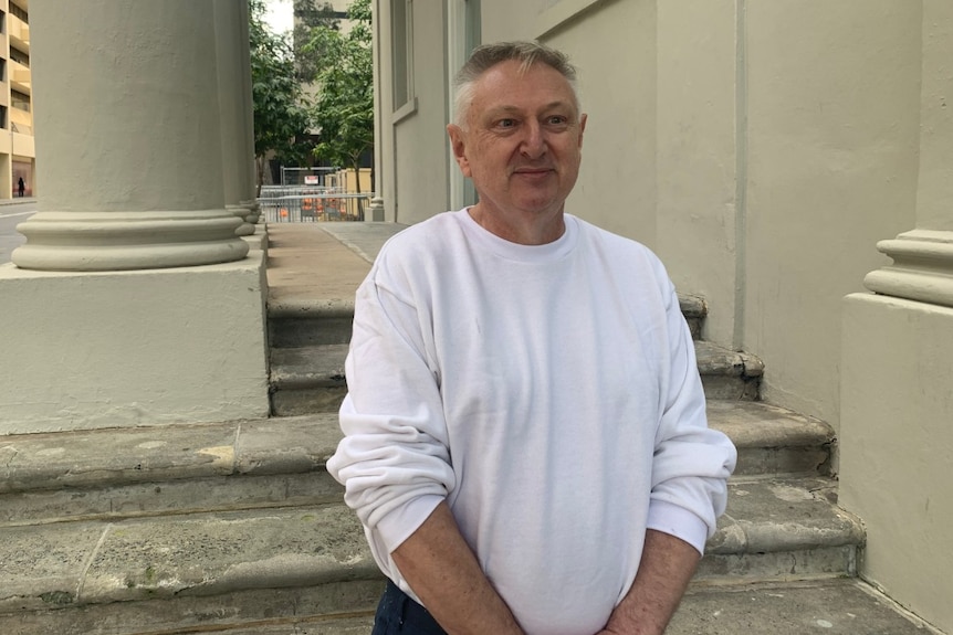 Edward Mason standing outside of a Perth court after he was sentenced.