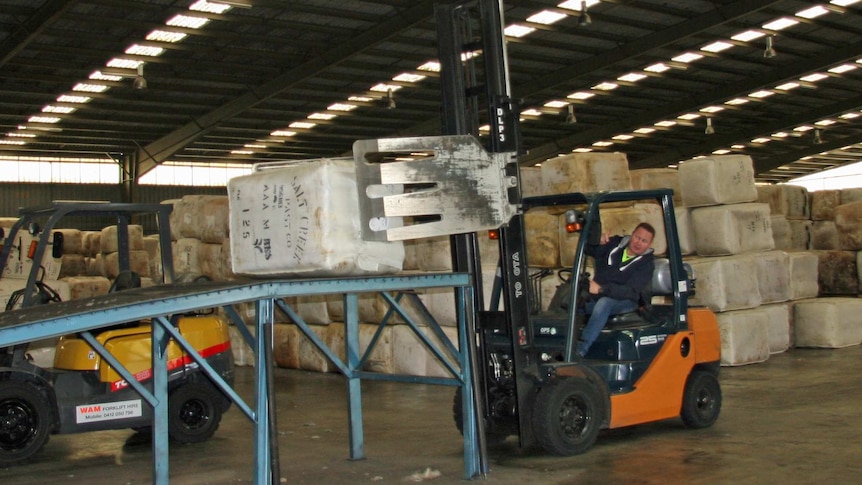 Wool bales stacked in a warehouse