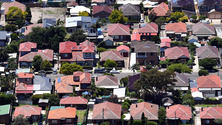 an aerial view of roof tops