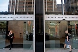 People walk in and out of the Reserve Bank Australia