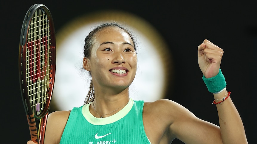 Zheng Qinwen celebrates winning her Australian Open semifinal.