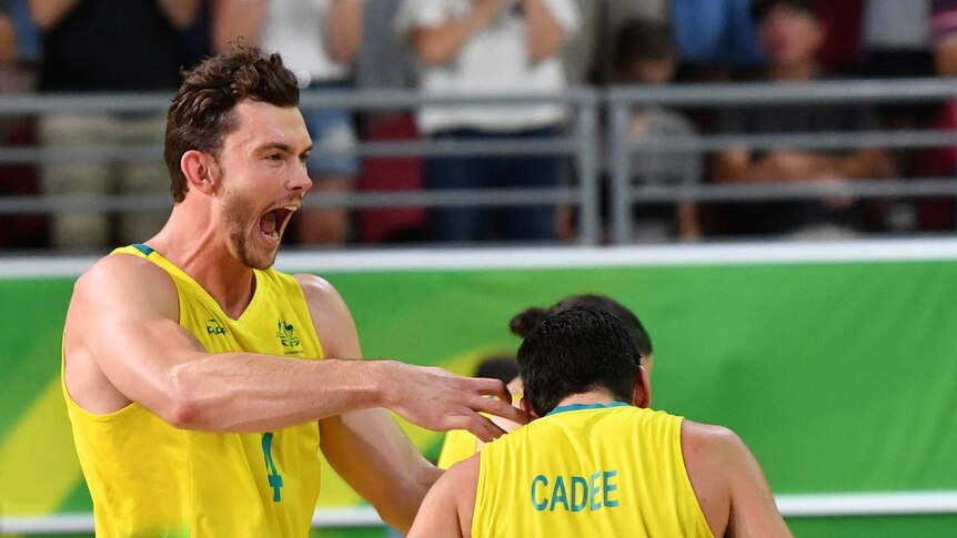 Australian basketballers celebrate winning Commonwealth Games gold medal