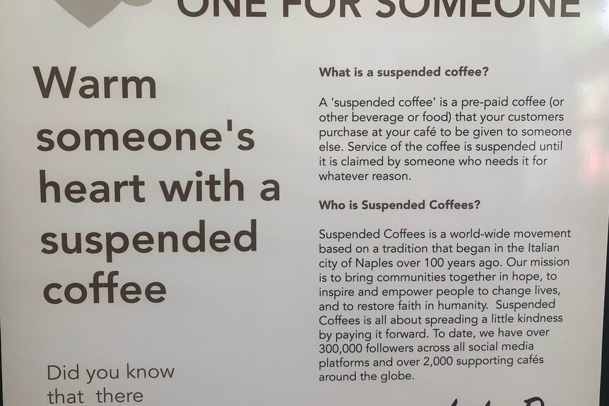 sign explaining suspended coffee at cafe
