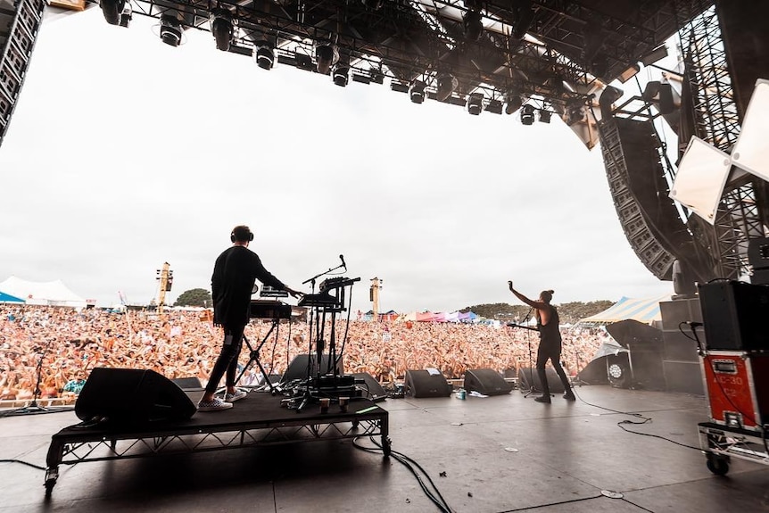 An image taken from behind the stage shows Boo Seeka performing at Beyond The Valley festival.