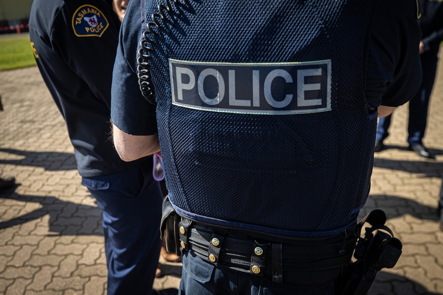 Torso of a Tasmanian police officer in uniform
