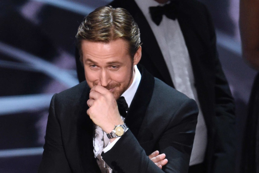 Ryan Gosling stifles a laugh after the wrong best picture winner was announced