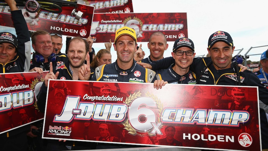 Jamie Whincup celebrates securing his sixth V8 Supercars title