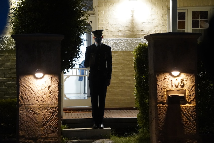 Max Murphy stands out the front of his house in full uniform.