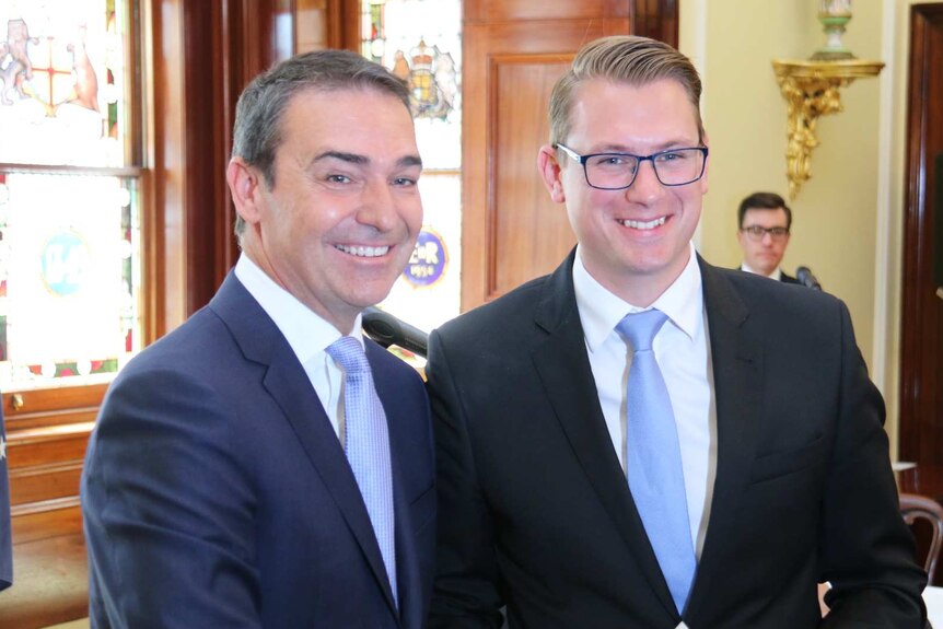 Steven Marshall shaking hands on the day his new Government is sworn in, March 22, 2018.