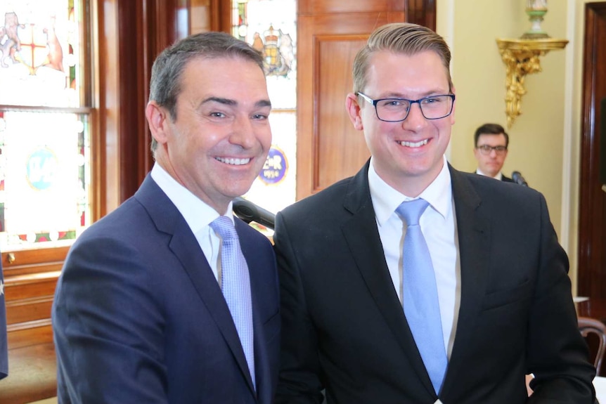 Steven Marshall shaking hands with Stephan Knoll on the day his new Government is sworn in, March 22, 2018.