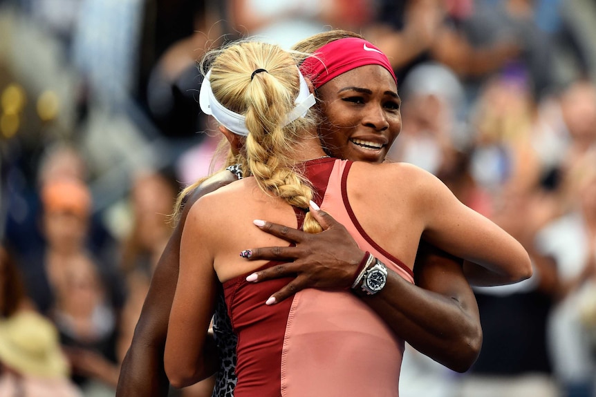 Williams embraces Wozniacki after winning US Open
