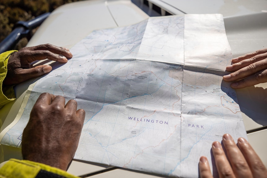 Mt Wellington map being used by fire management employees.
