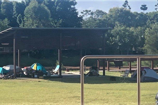 a collection of tents in a park at Hervey Bay where homeless people are living
