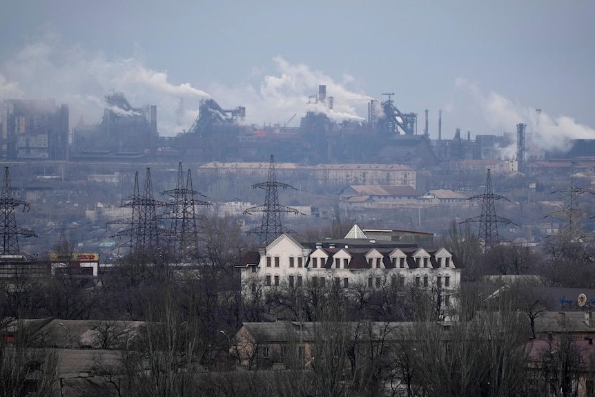 A view of a large factory in the bacground