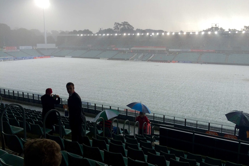 Hail covers Parramatta's Pirtek Stadium.