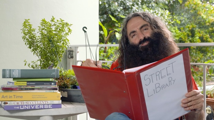 Costa with Street Library folder