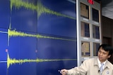 A South Korean meteorological official shows reporters the seismic waves from the nuclear test