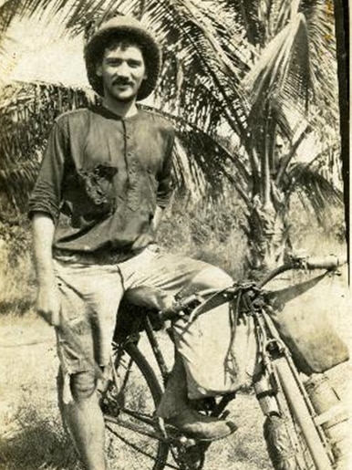 Portrait of Ted Ryko with his bike