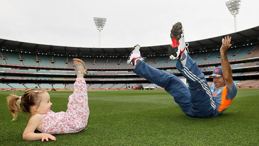 Ricky Ponting plays with daughter Emmy during a training session at the MCG.