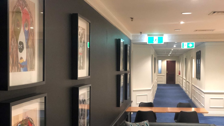 The corridor at MacMines's Brisbane office, at the address on its website, has been vacant for months.