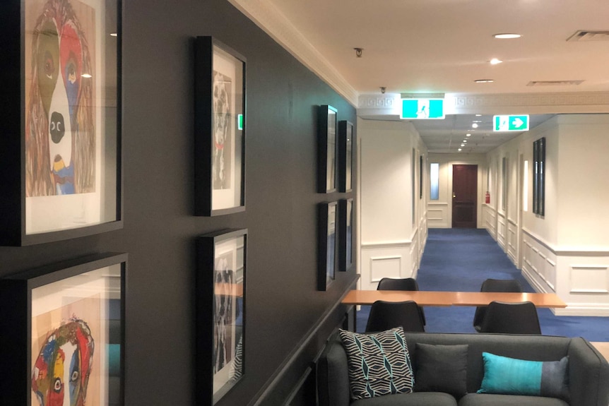 The corridor at MacMines's Brisbane office, at the address on its website, has been vacant for months.