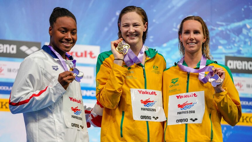 Simone Ashley Manuel of the United States, Cate Campbell and Emma Mckeon of Australia during the medal presentation ceremony.