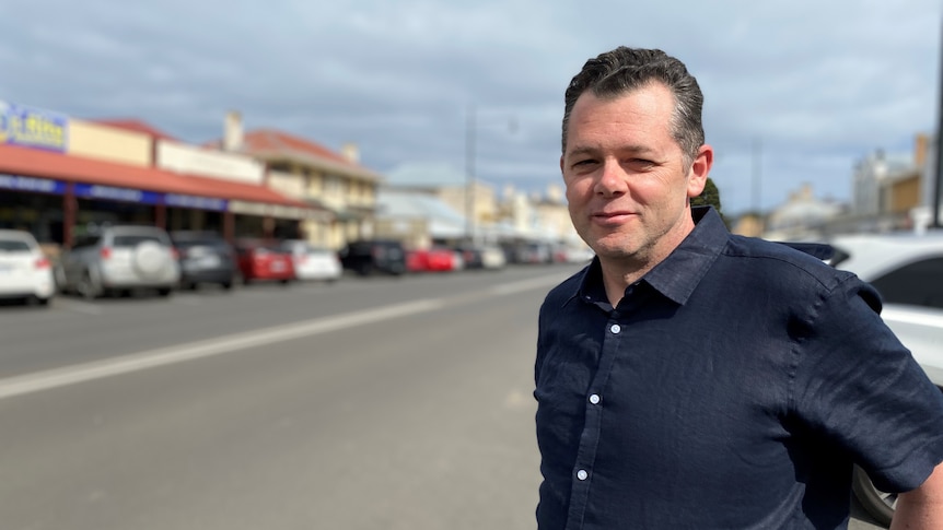 Justin Williams stands in Port Fairy's main street