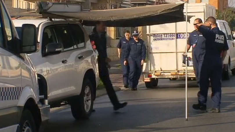 Forensic police outside a house in the Perth suburb of Harrisdale where a baby is believed to have been exposed to gas