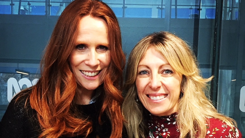 Comedian Catherine Tate and host Richelle Hunt smile in front of the ABC Radio Melbourne studio