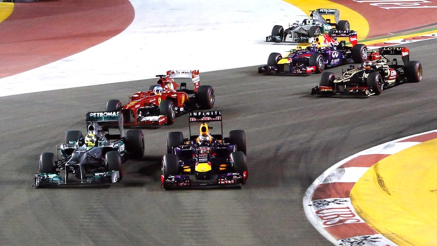 Vettel takes over Nico Rosberg in Singapore