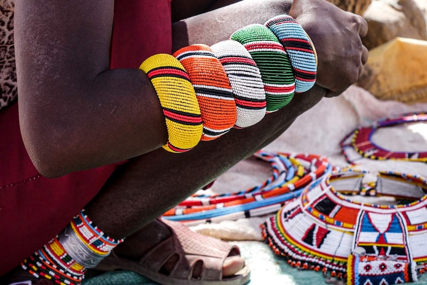 A woman in the Kenyan community of Unity wears colourful beadwork.