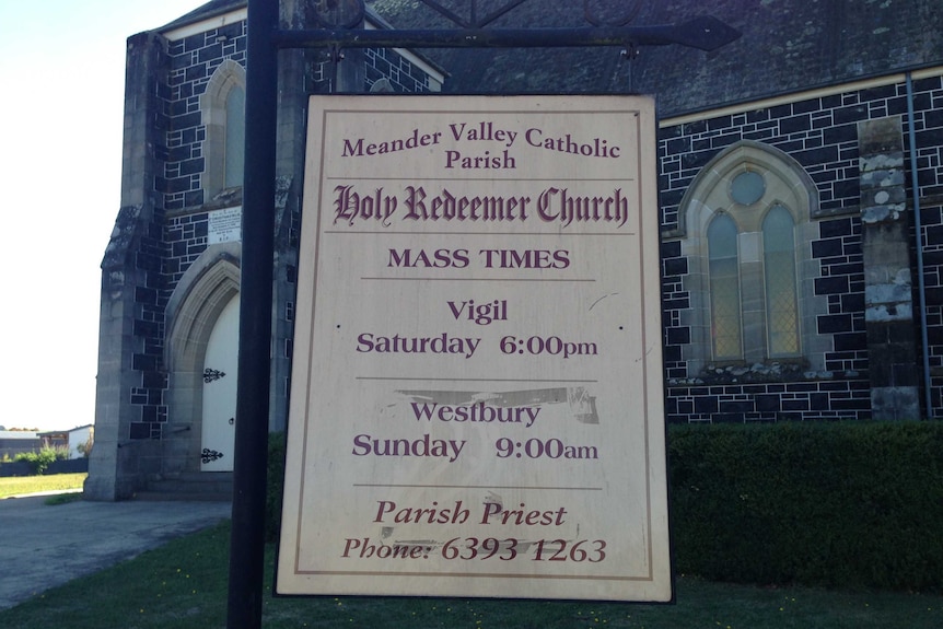 The sign out the front of the Holy Redeemer Church in Deloraine, Tasmania.