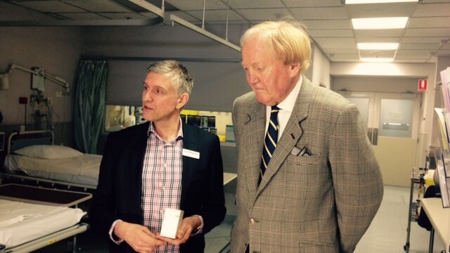 Professor Grant McArthur from the Peter MacCallum Cancer Centre (left) and Ron Walker (right).