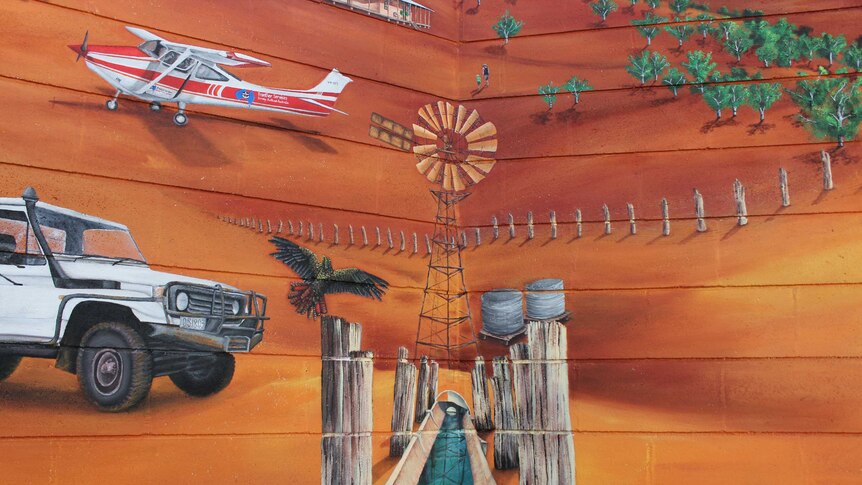Windmill and trough in Alice Springs School of the Air mural