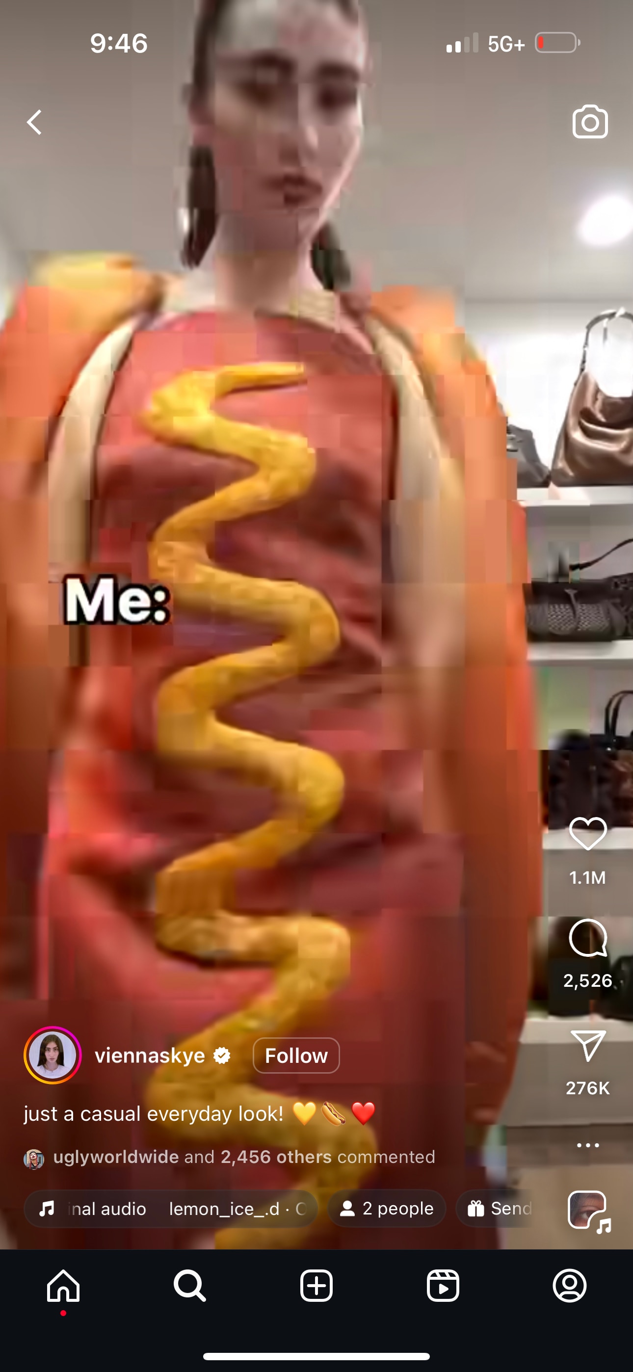 A screenshot of an Instagram reel where a woman is wearing a hotdog costume.