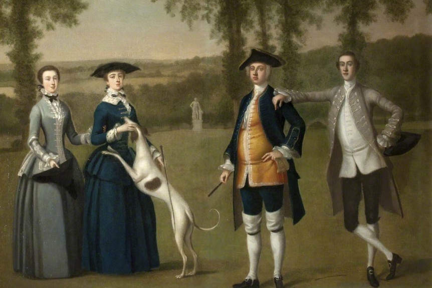 A 1700s painting of two English men and women in formal outfits of the period,  with a dog