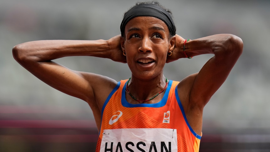 World champ Hassan falls, gets up and wins 1,500 heat in Tokyo