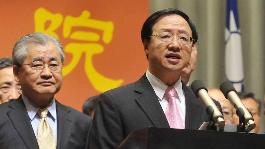 Taiwan's premier Jiang Yi-huah speaks next to vice premier Mao Chi-kuo during a press conference