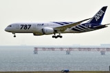 The first All Nippon Airways (ANA) Boeing 787 Dreamliner arrives at Tokyo's Haneda airport on September 28, 2011.