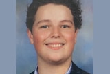 A school photo of a teenaged boy