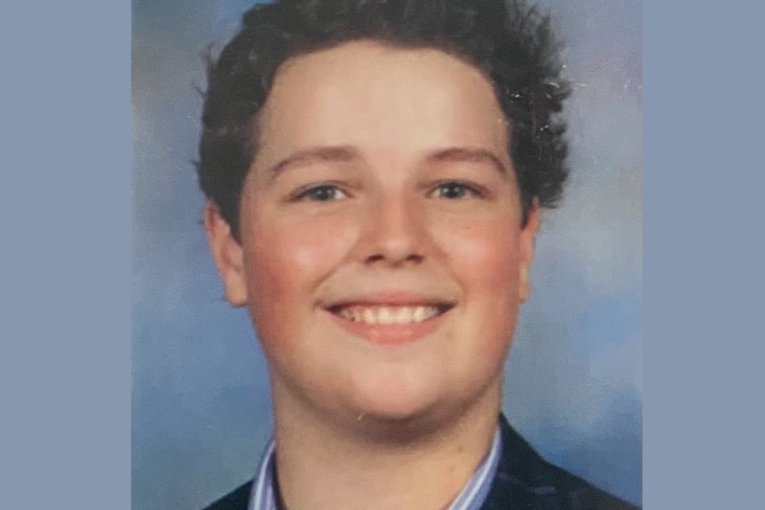 A school photo of a teenaged boy