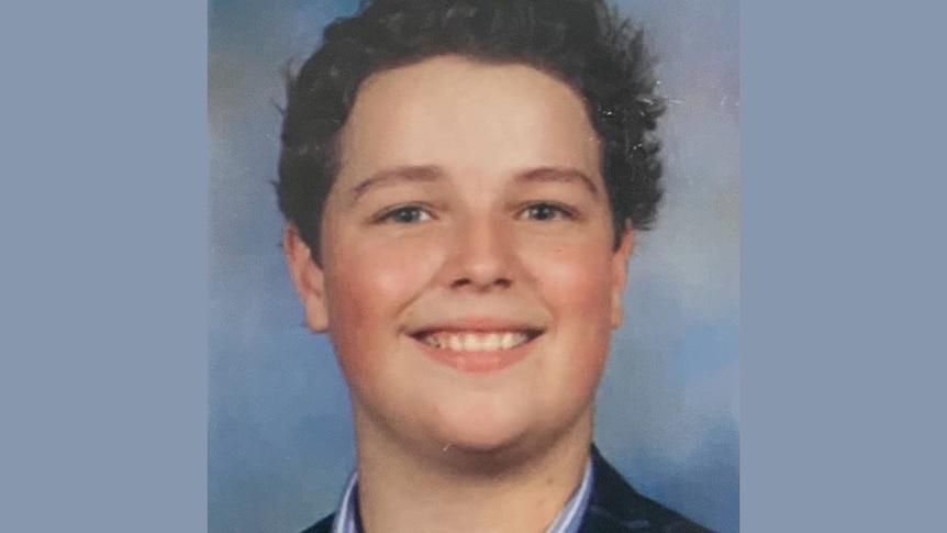 A school photo of a teenaged boy