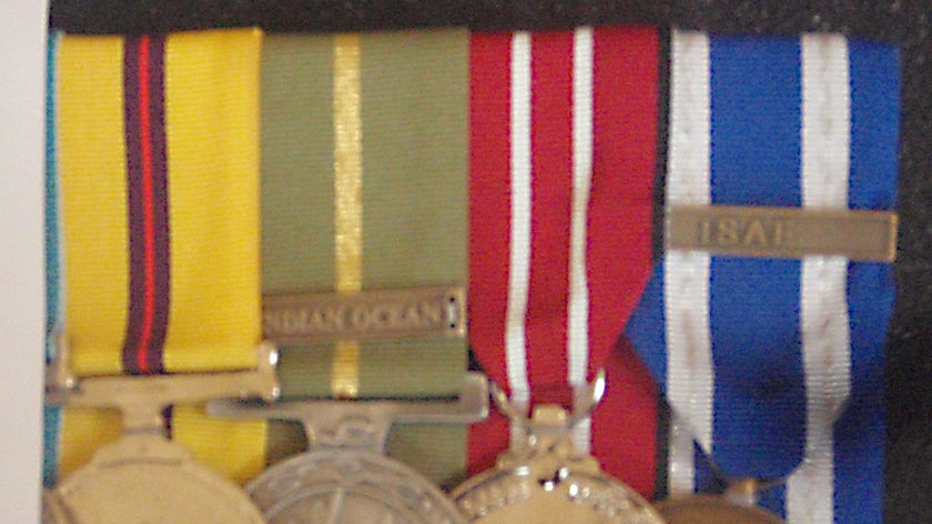 These are copies of the four medals which were stolen from an Ainslie home.